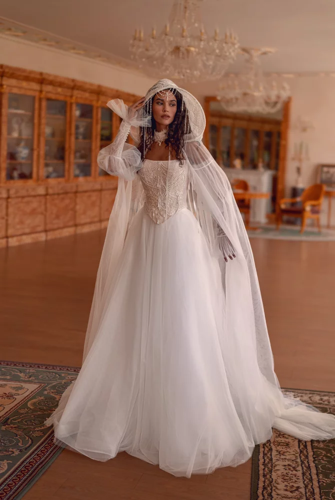 Marama with sleeves and cape 